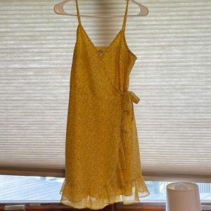 Yellow dress with light green and white flower pattern